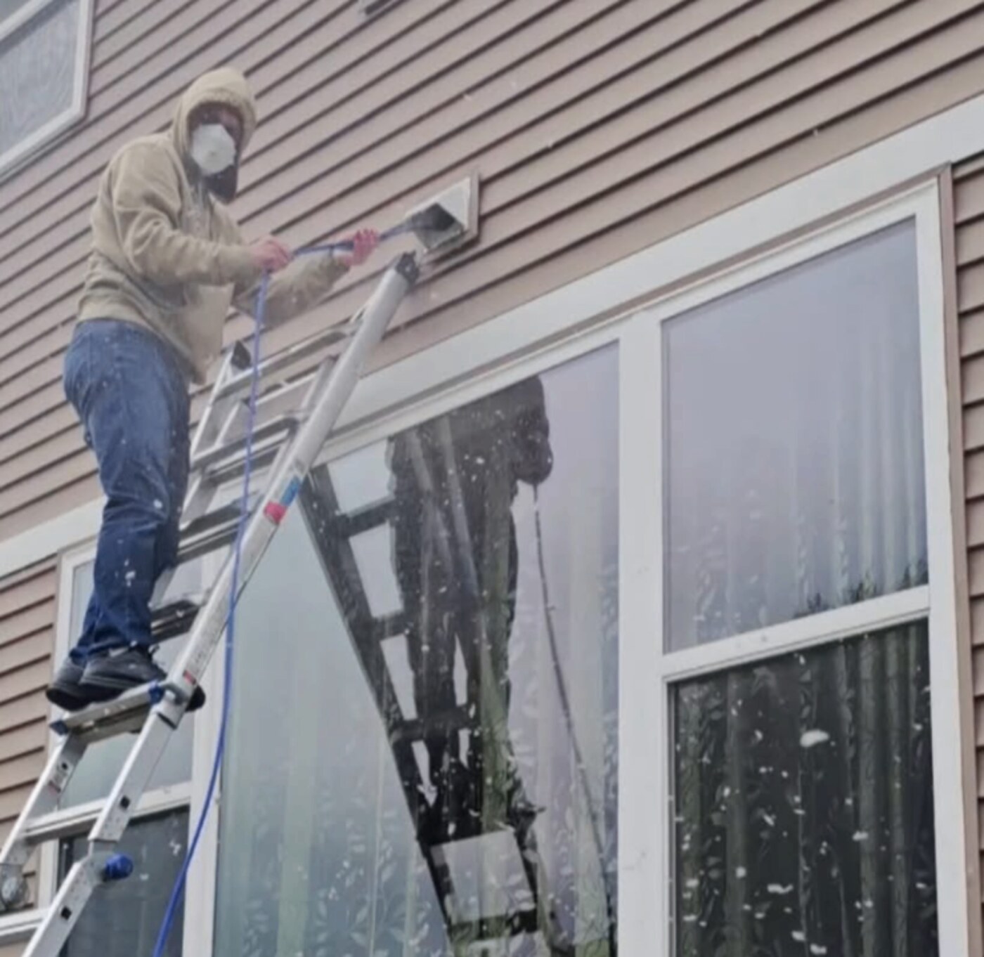 Second-story dryer vent cleaning